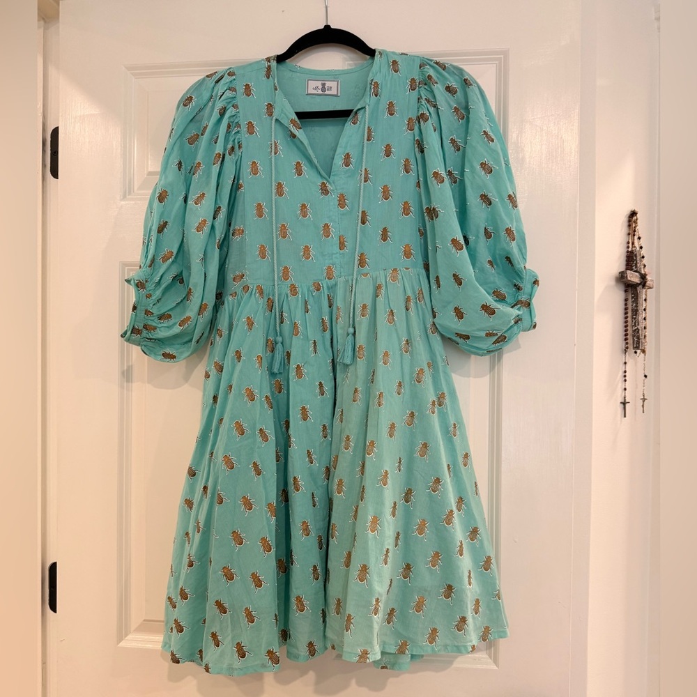 Elegant Teal Dress with Gold Accents